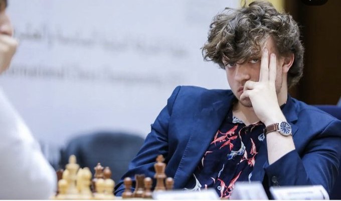 Teenage grandmaster sues world chess champion for defamation